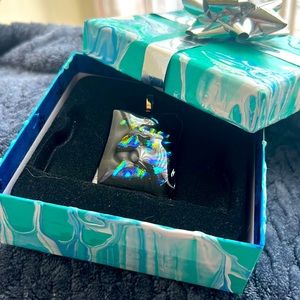 Opal embedded glass pendant